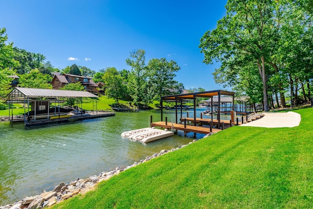 4910 Shoreline Dr, Chattanooga, TN 37416 - dock featuring boat lift, a water view, and a lawn