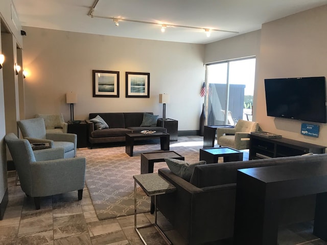 living room featuring track lighting