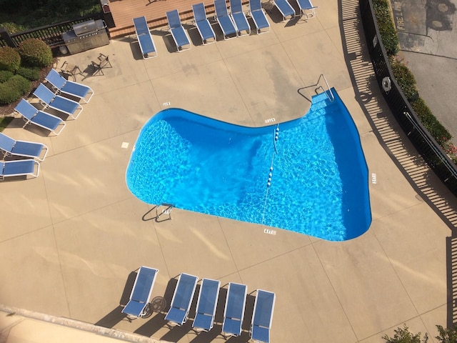pool with a patio