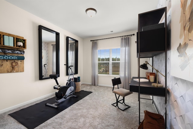 carpeted office with baseboards and visible vents