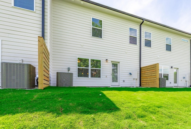 11304 Cape Vw, Soddy Daisy, TN 37379 - back of house featuring central AC unit and a lawn