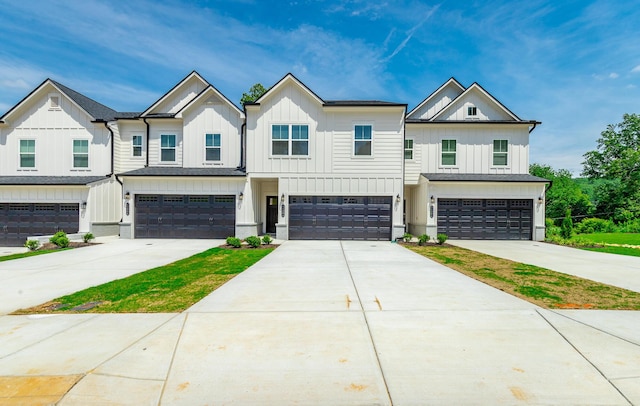 11304 Cape Vw, Soddy Daisy, TN 37379 - townhome / multi-family property with board and batten siding, a garage, and driveway