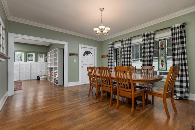 3308 Alta Vista Dr, Chattanooga, TN 37411 - dining room with baseboards, ornamental molding, a notable chandelier, and wood-type flooring