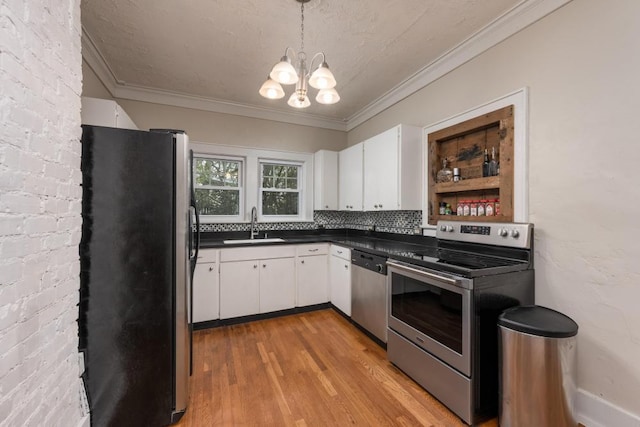 3308 Alta Vista Dr, Chattanooga, TN 37411 - kitchen with a notable chandelier, a sink, white cabinetry, appliances with stainless steel finishes, and dark countertops