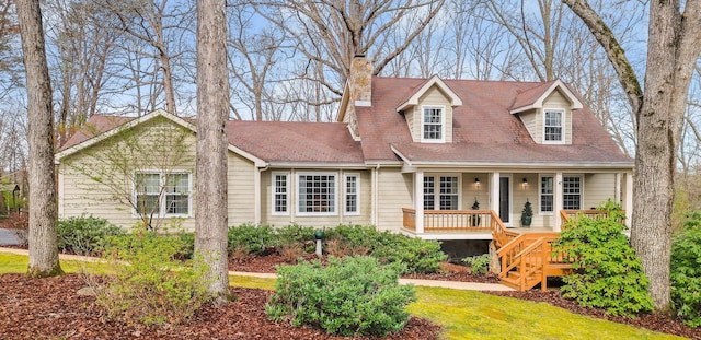 703 Windy Way, Signal Mountain, TN 37377 - cape cod-style house featuring covered porch, a chimney, and stairway