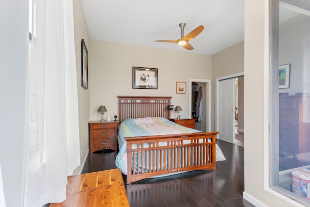 bedroom featuring baseboards and wood finished floors