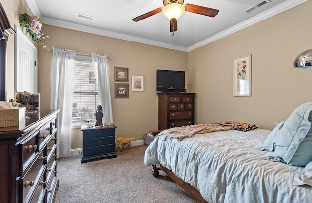 bedroom featuring ornamental molding, visible vents, and light colored carpet