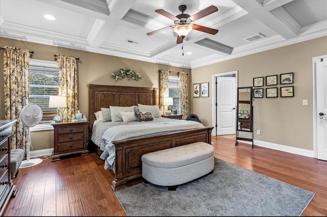 bedroom with baseboards, visible vents, and hardwood / wood-style floors