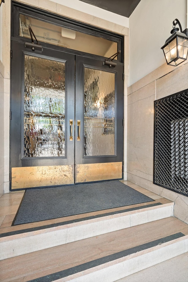 doorway to property featuring french doors