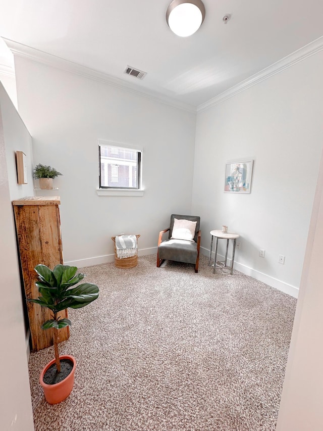 129 Walnut St # 122, Chattanooga, TN 37403 - living area featuring crown molding, visible vents, baseboards, and carpet