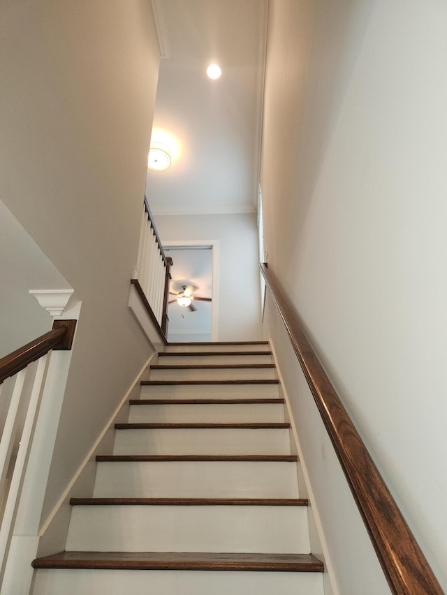 stairway featuring crown molding, recessed lighting, and a ceiling fan