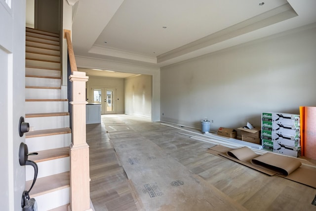 6649 Dharma Loop Unit 119, Chattanooga, TN 37412 - entrance foyer with wood finished floors, stairway, crown molding, and a raised ceiling