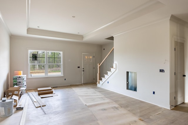 6649 Dharma Loop Unit 119, Chattanooga, TN 37412 - living area with stairway, light wood-style floors, crown molding, and a raised ceiling