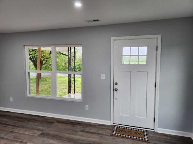 185 Carolina Ave, Delano, TN 37325 - foyer with visible vents, baseboards, and dark wood-style floors