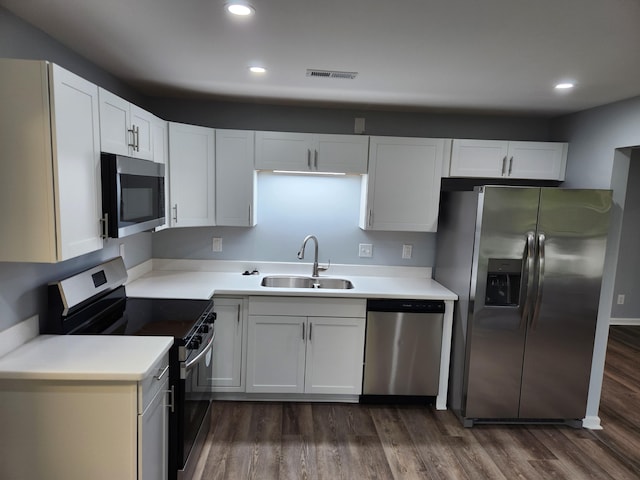 185 Carolina Ave, Delano, TN 37325 - kitchen with a sink, visible vents, appliances with stainless steel finishes, and white cabinetry