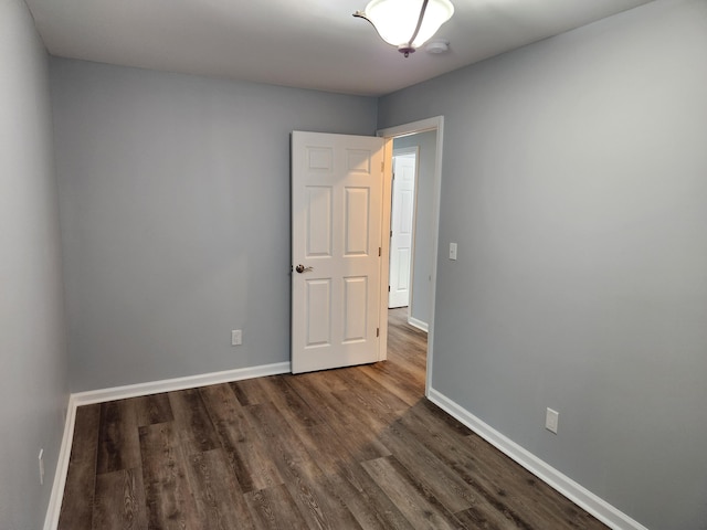 185 Carolina Ave, Delano, TN 37325 - spare room with baseboards and wood finished floors