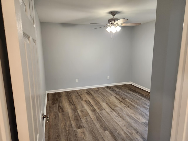 185 Carolina Ave, Delano, TN 37325 - spare room with dark wood-style floors, baseboards, and a ceiling fan
