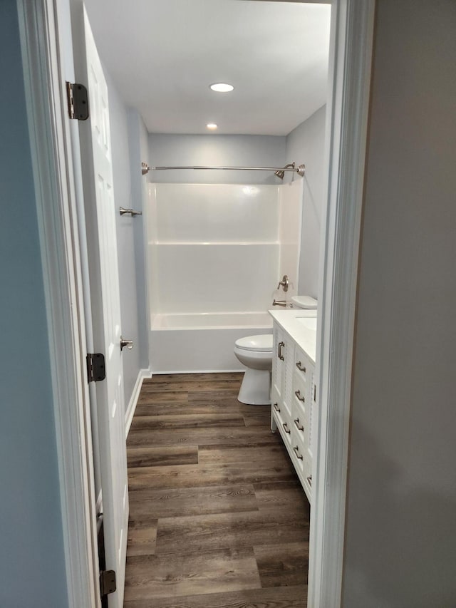 185 Carolina Ave, Delano, TN 37325 - full bath with washtub / shower combination, vanity, recessed lighting, toilet, and wood finished floors