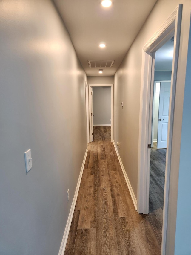 185 Carolina Ave, Delano, TN 37325 - corridor with attic access, dark wood-style flooring, baseboards, and visible vents