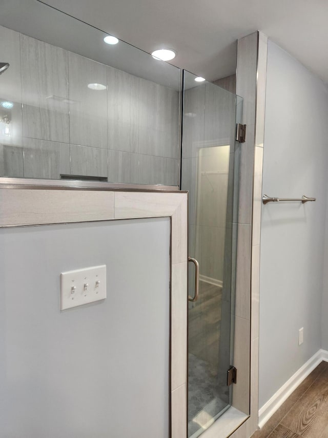 185 Carolina Ave, Delano, TN 37325 - full bathroom with baseboards, recessed lighting, a stall shower, and wood finished floors