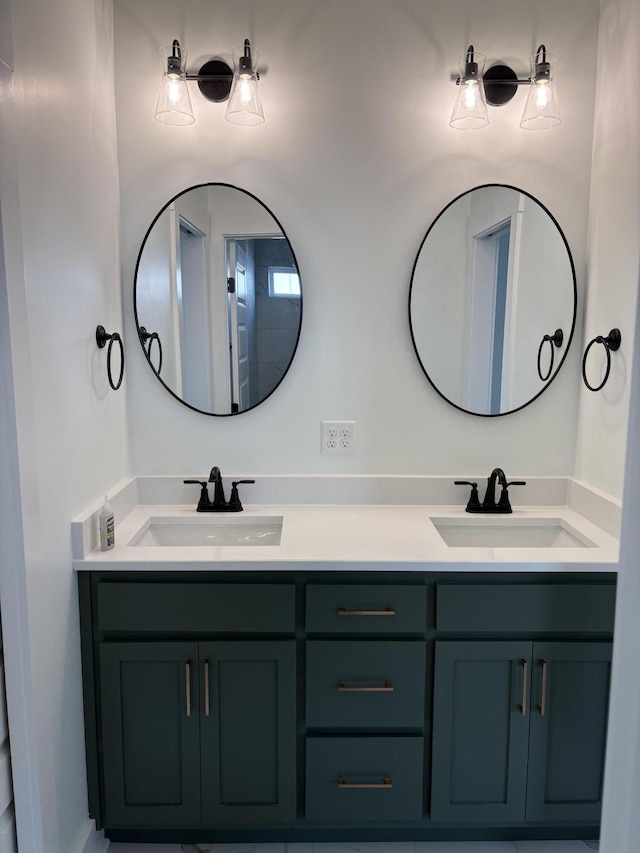 full bath with a sink and double vanity