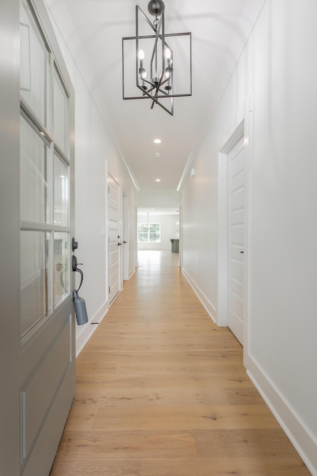 9532 N Valley Trl, Ooltewah, TN 37363 - hall with a chandelier, light wood-type flooring, baseboards, recessed lighting, and crown molding