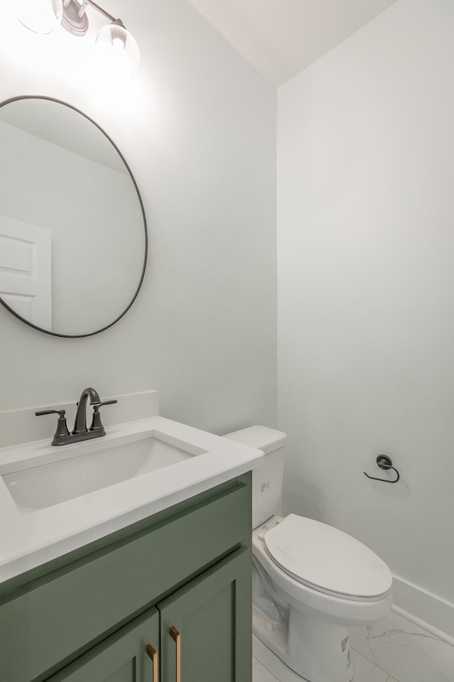 9532 N Valley Trl, Ooltewah, TN 37363 - bathroom with vanity, toilet, marble finish floors, and baseboards