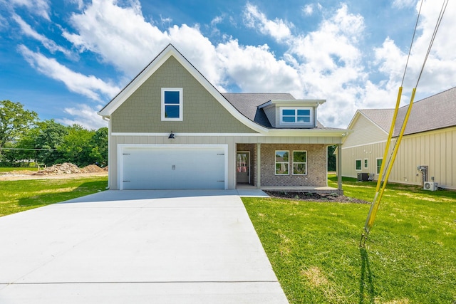 9532 N Valley Trl, Ooltewah, TN 37363 - craftsman inspired home with a front lawn, driveway, covered porch, brick siding, and an attached garage