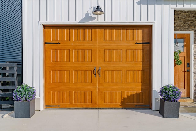garage with concrete driveway