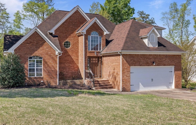 traditional-style house featuring roof with shingles, brick siding, a front lawn, concrete driveway, and an attached garage