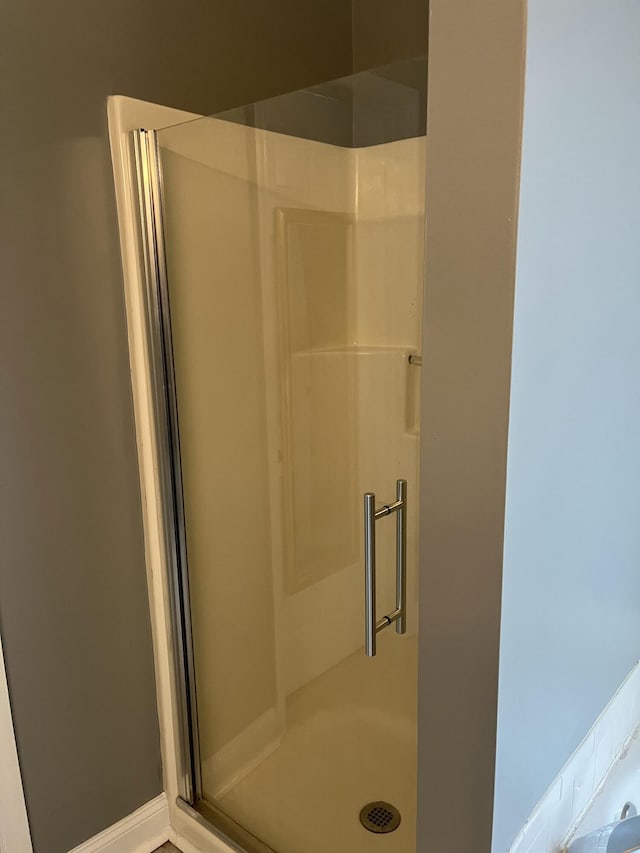 bathroom with a stall shower