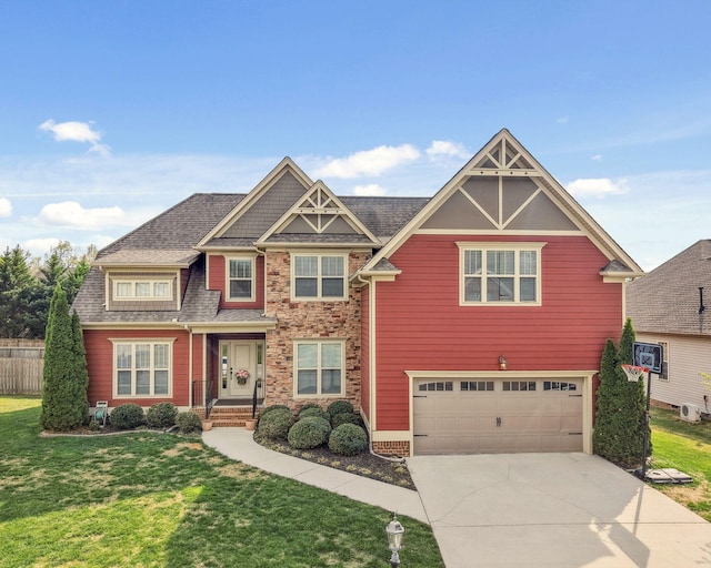 view of front of property featuring stone siding, concrete driveway, a front lawn, a shingled roof, and a garage