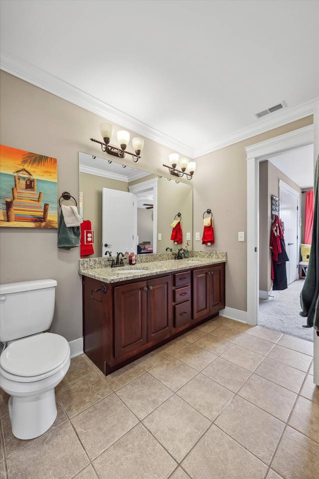 full bathroom featuring toilet, a sink, ornamental molding, and visible vents