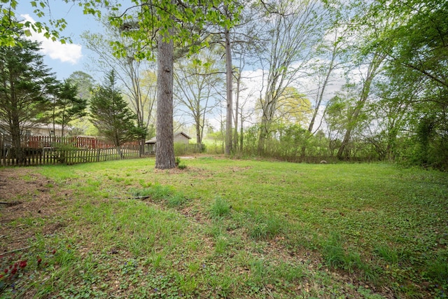 view of yard featuring fence