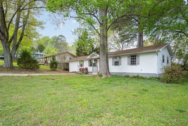 single story home with a front lawn