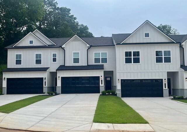 11303 Cape Vw Unit 16, Soddy Daisy, TN 37379 - view of front of property with an attached garage, board and batten siding, and driveway