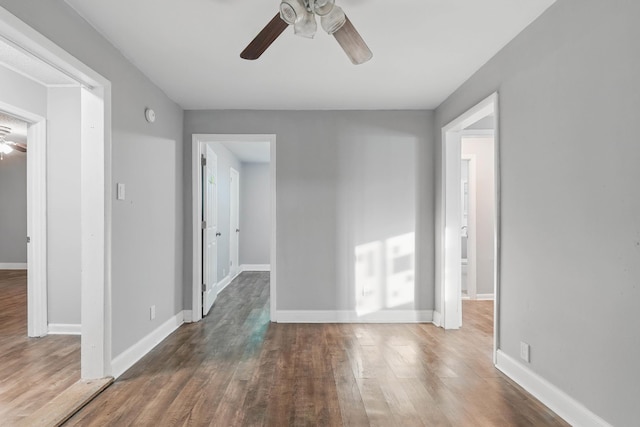5503 Oleary St, Chattanooga, TN 37410 - empty room with wood finished floors, baseboards, and a ceiling fan