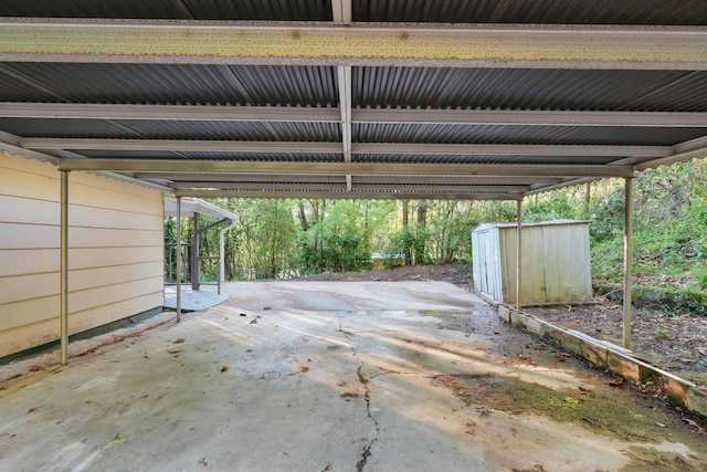 5503 Oleary St, Chattanooga, TN 37410 - view of parking / parking lot with a carport and a storage unit