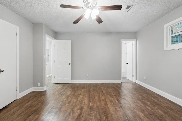5503 Oleary St, Chattanooga, TN 37410 - spare room with dark wood-type flooring, visible vents, baseboards, and ceiling fan