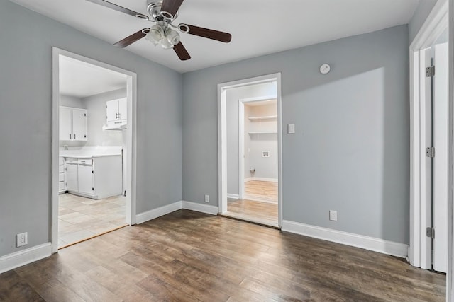 5503 Oleary St, Chattanooga, TN 37410 - unfurnished bedroom with ensuite bathroom, baseboards, and wood finished floors