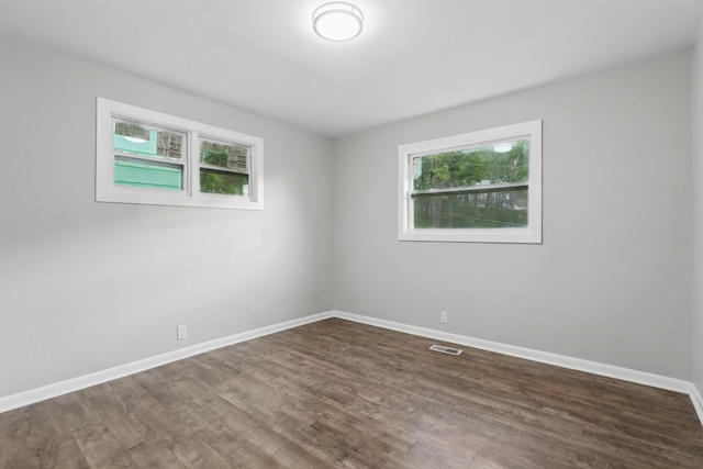 5503 Oleary St, Chattanooga, TN 37410 - unfurnished room with visible vents, baseboards, and dark wood finished floors