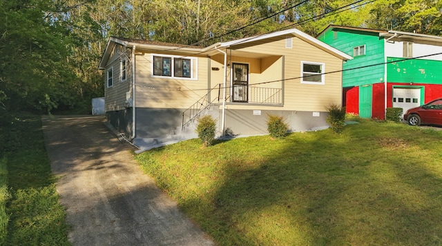 5503 Oleary St, Chattanooga, TN 37410 - view of front of home with crawl space and a front lawn