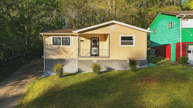 5503 Oleary St, Chattanooga, TN 37410 - view of front of property featuring crawl space and a front yard