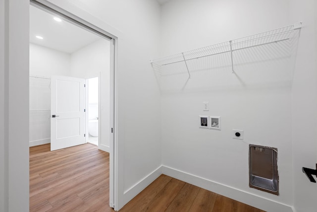 3354 Hawks Creek Dr, Apison, TN 37302 - laundry room featuring electric dryer hookup, wood finished floors, hookup for a washing machine, and recessed lighting