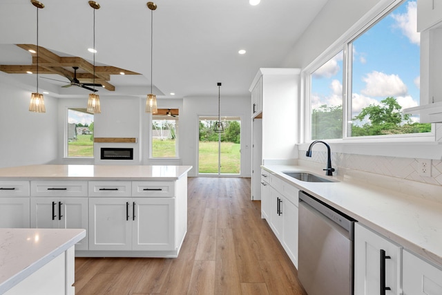 3354 Hawks Creek Dr, Apison, TN 37302 - kitchen with dishwasher, recessed lighting, light wood-type flooring, a ceiling fan, and pendant lighting