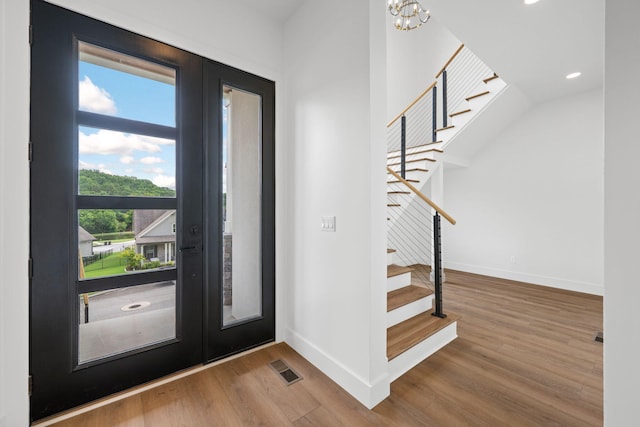 3354 Hawks Creek Dr, Apison, TN 37302 - entrance foyer featuring stairway, wood finished floors, a chandelier, and recessed lighting