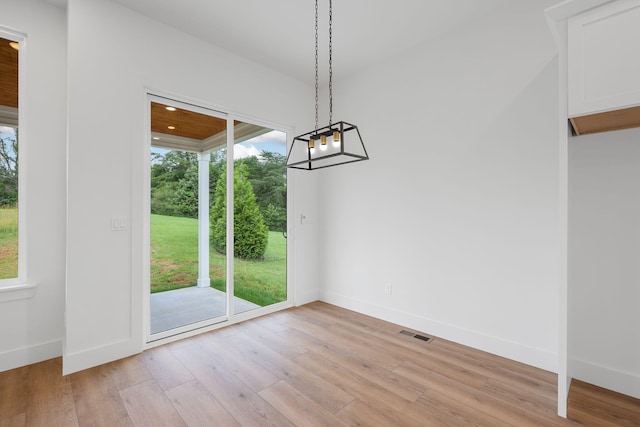 3354 Hawks Creek Dr, Apison, TN 37302 - unfurnished dining area featuring healthy amount of natural light and light wood-style floors