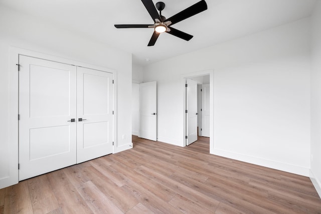 3354 Hawks Creek Dr, Apison, TN 37302 - unfurnished bedroom with light wood-style floors, a closet, and a ceiling fan