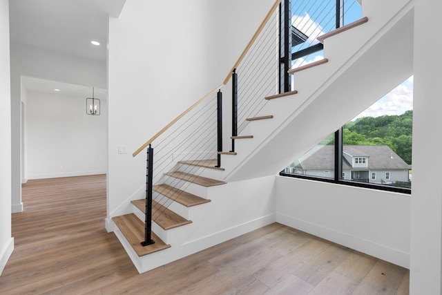 3354 Hawks Creek Dr, Apison, TN 37302 - stairs with wood finished floors, healthy amount of natural light, and recessed lighting