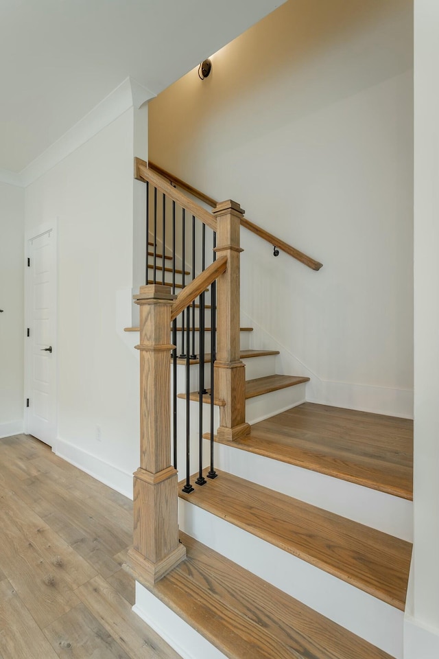 5735 Acadia Dr, Chattanooga, TN 37415 - staircase featuring baseboards, ornamental molding, and wood finished floors
